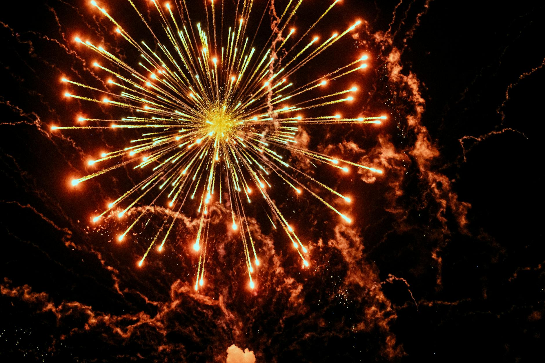 red fireworks on night sky
